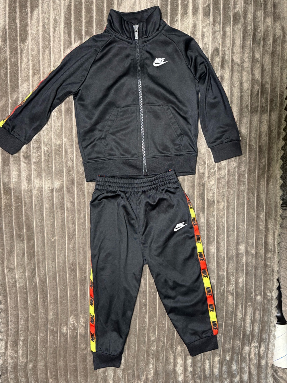 18 months Nike Black Track Pants with Red and Yellow Stripe Trim